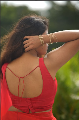 “Rangrez Pink orange” chiffon saree with stitched blouse.